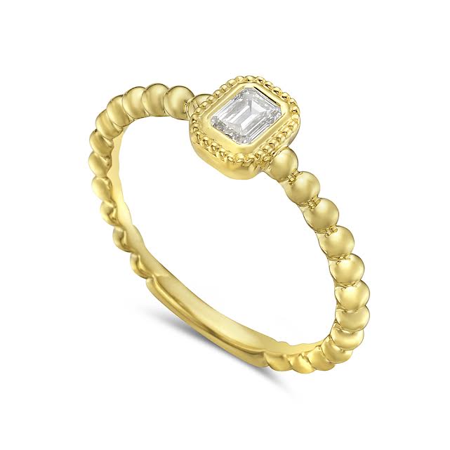 14ky beaded band with 1 emerald cut diamond 0.21ct