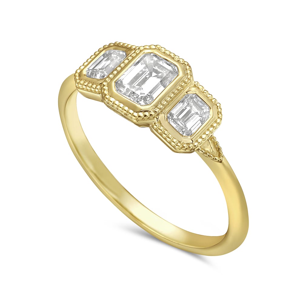 14k ring wit 3 emerald cur diamonds 0.75ct