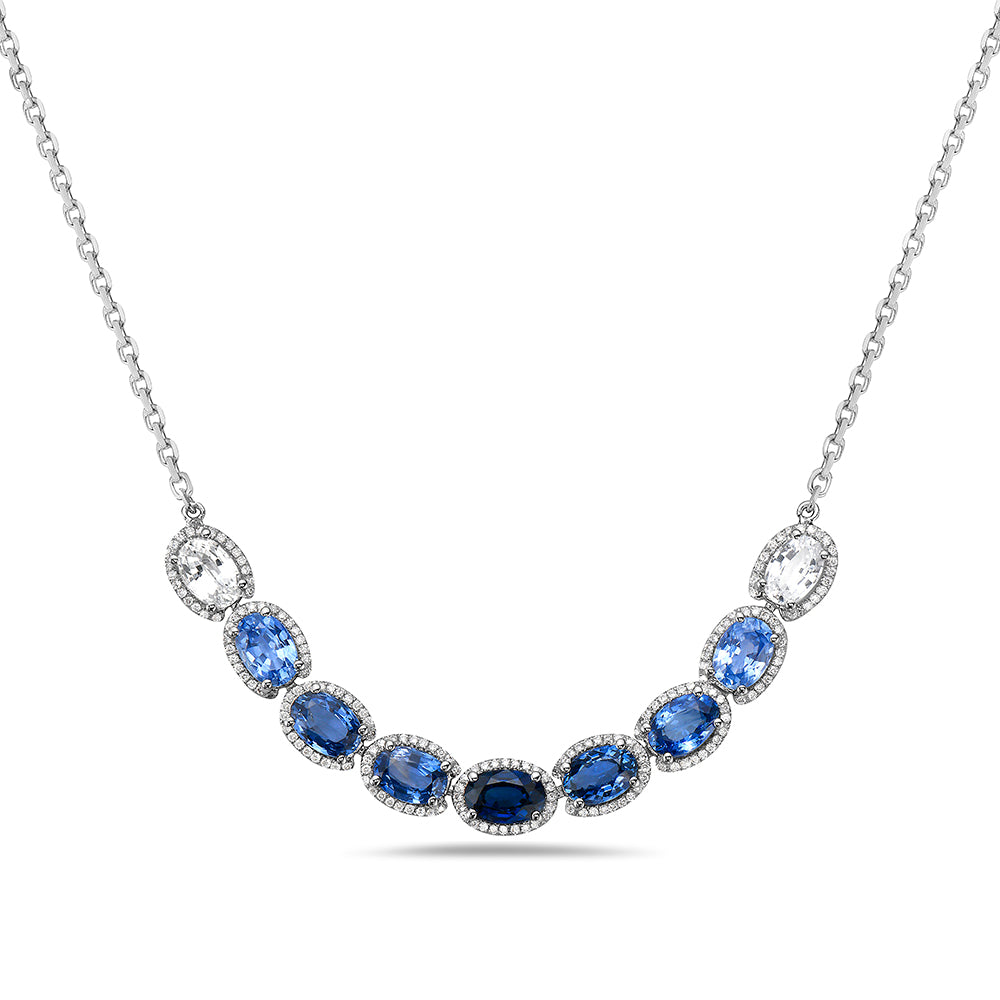 14K PENDANT WITH 2 WHITE SAPPHIRES 0.91CT, 7 FANCY BLUE SAPPHIRES 4.17CT AND 192 DIAMONDS 0.36CT ON 18 INCHES CABLE CHAIN