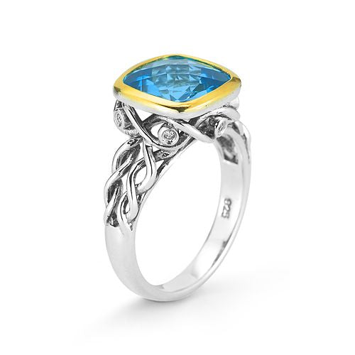 STERLING SILVER RING WITH A 14KY SQUARE BEZZEL SET WITH BLUE TOPAZ  AND  0.04CT DIAMONDS.