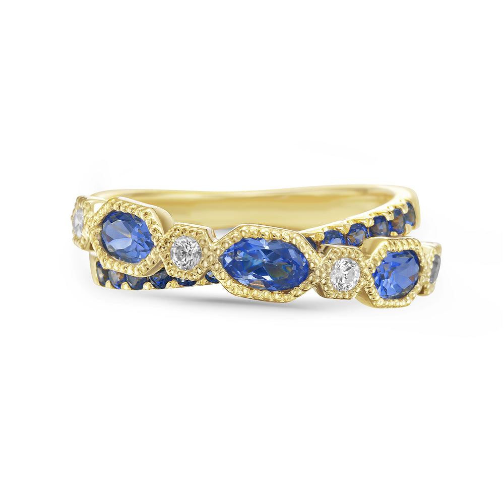14KY ring with 3 oval sapphires 0.96ct tw, 12 round sapphires 0.34ct tw, and 4 diamonds 0.14ct tw 5.5