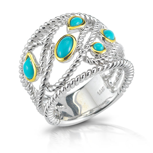 STERLING SILVER  RING WITH 14K GOLD BEZEELS SET WITH RECON TURQUOISE.