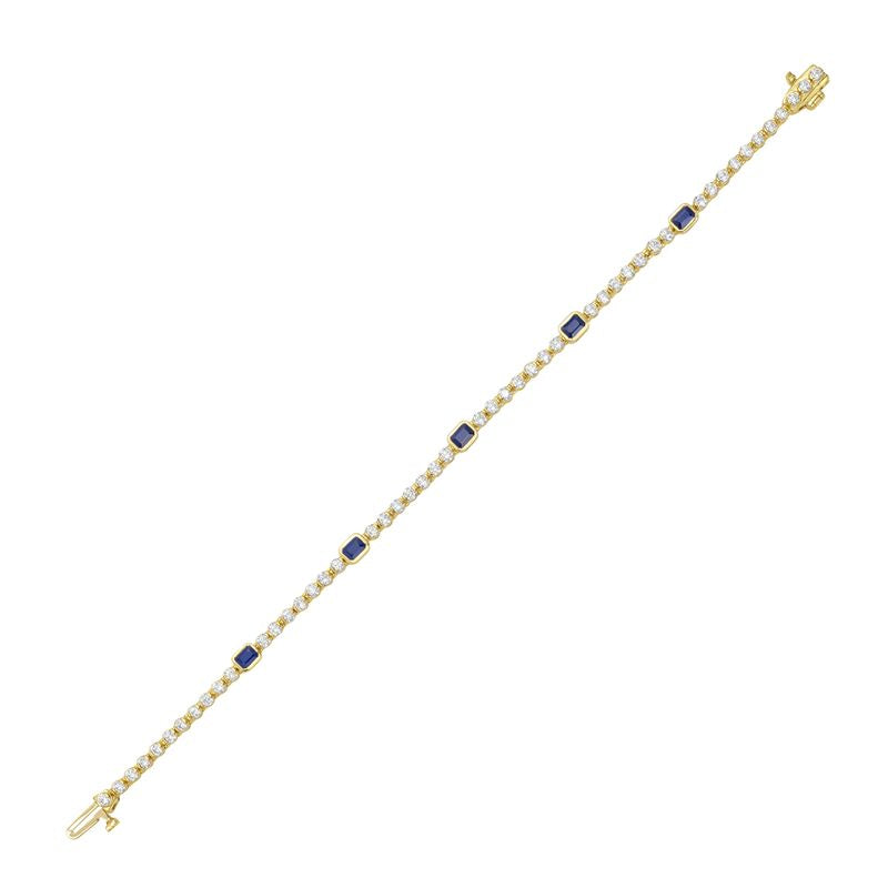 14KY 7 inch bracelet with 48 round diamonds 2.23ct tw and 5 emerald cut sapphires 1.23ct tw 4.4