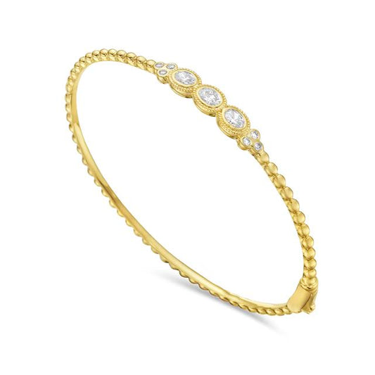 14ky 6mm bangle with 9 diamonds oval & round tw 0.71ct