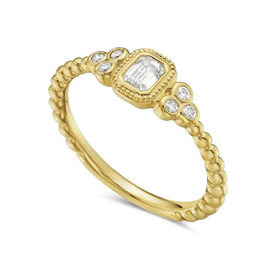 14ky ring with 6 round diamonds 0.07ct & 1 emerald cut 0.21ct, t.w. 0.28ct