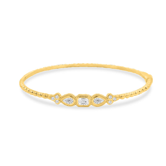 14k bangle with 6 round diamonds 0.10ct, 2 pear 0.29ct & 1 emerald diamond 0.24ct, tw 0.63ct