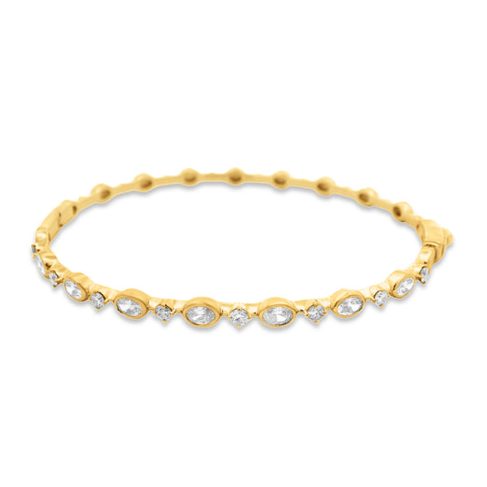 14KY 4mm Bangle with 8 round diamonds 0.43ct and 7 oval diamonds 0.90 Total weight 1.33ct