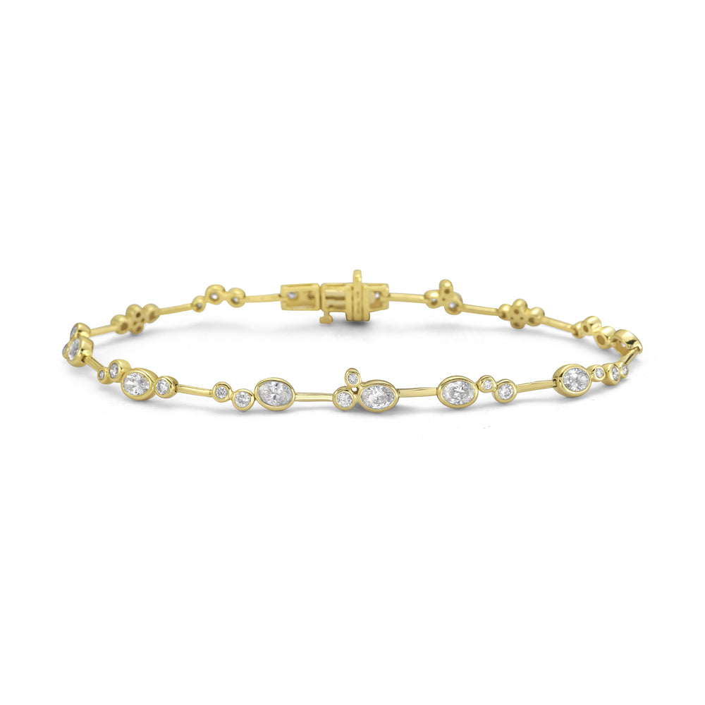 14k 5mm link bracelet with 36 round diamonds 0.64ct & 7 oval 1.00ct t.w. 1.64ct 7 inches wrist