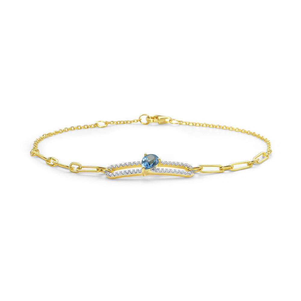14KY bracelet with 1 blue topaz 0.47ct and and 37 diamonds 0.15ct tw 5.5