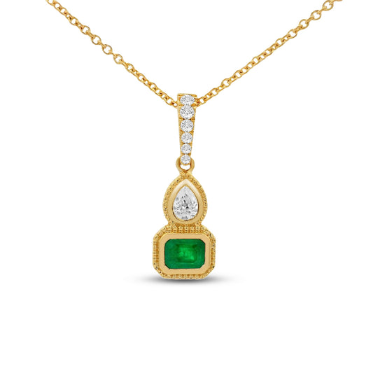 14k 17mm long pendant with 6 round diamonds 0.04ct, 1 pear shape 0.06ct & 1 ec emerald 0.13ct on 18 inches chain