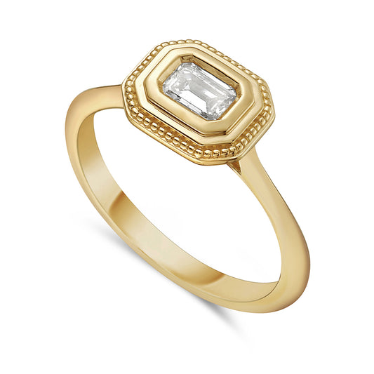 14k 10x8 octagon shape ring with 1 emerald cut diamond 0.31ct