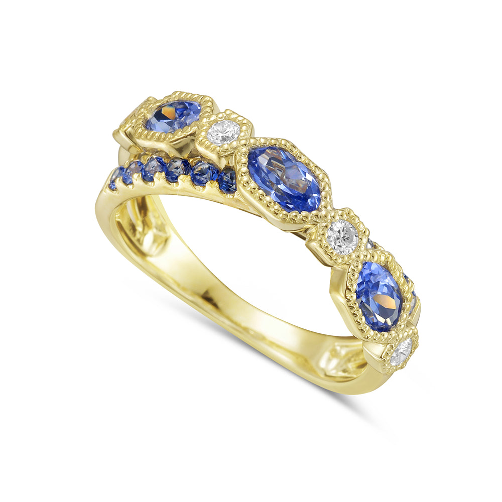 14KY ring with 3 oval sapphires 0.96ct tw, 12 round sapphires 0.34ct tw, and 4 diamonds 0.14ct tw 5.5