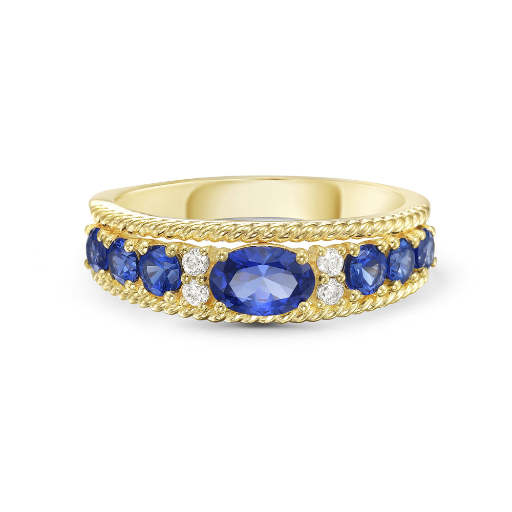 14KY ring with 7 medium blue sapphires 1.4ct tw and 4 diamonds 0.08ct tw 5.5