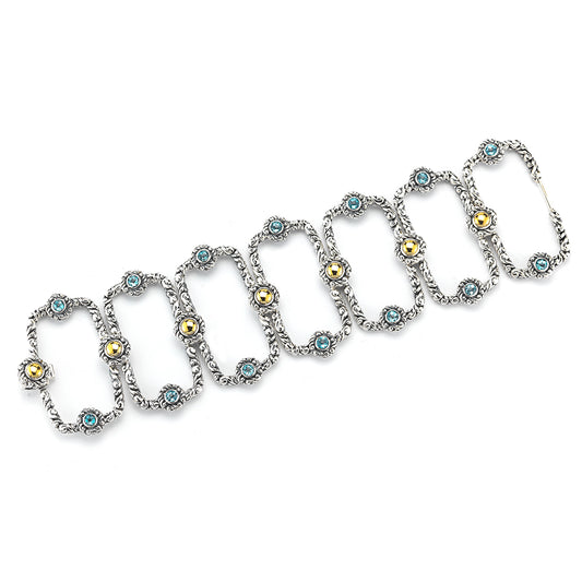 STERLING SILVER AND 14K YELLOW GOLD BLUE TOPAZ BRACELET