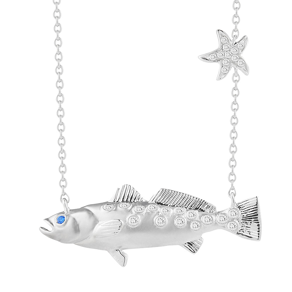 14K FISH PENDANT WITH 0.06CT DIAMONDS & SAPPHIRE EYES, 18" CHAIN 1" LONG BY 1/4" WIDE
