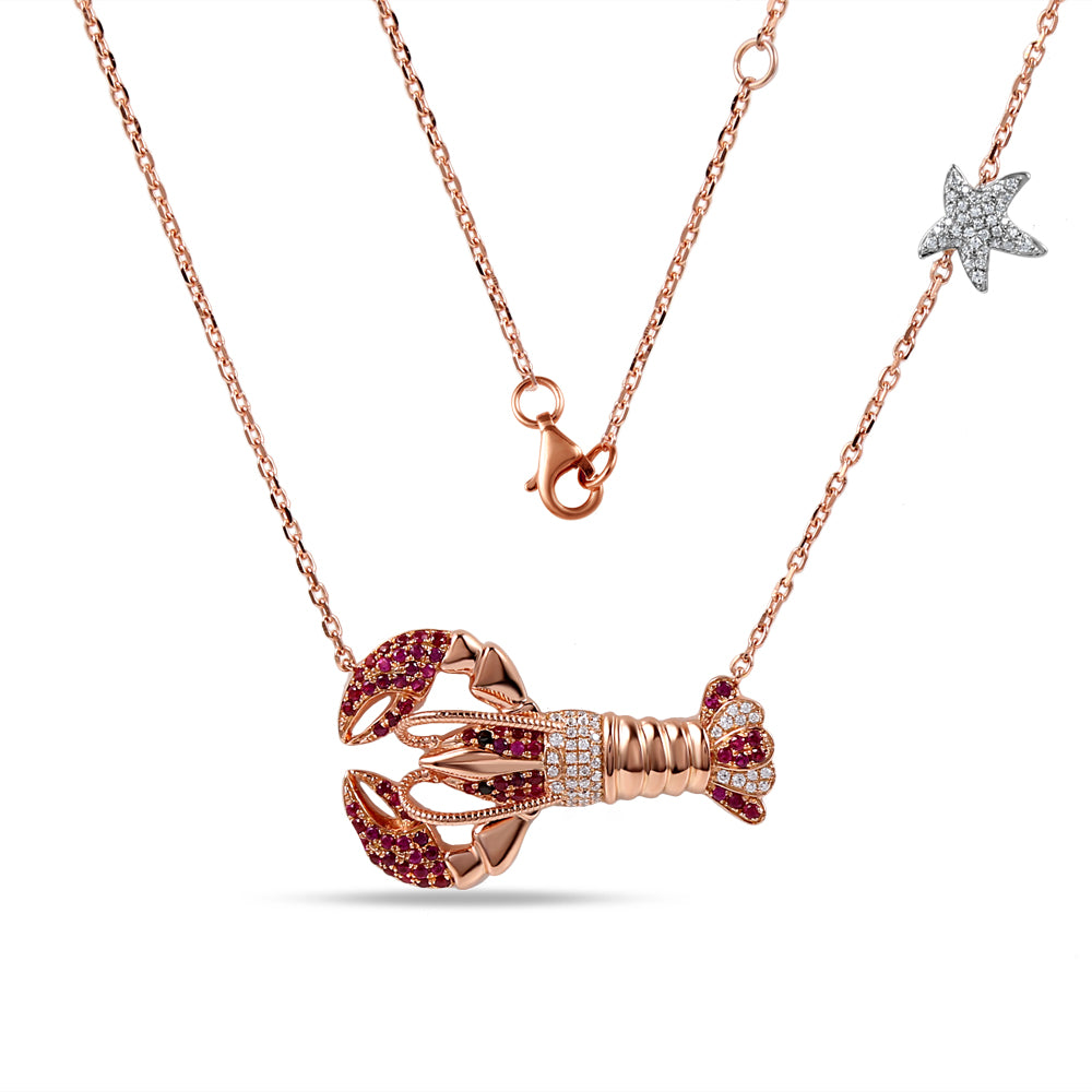 14K LOBSTER PENDANT WITH 83 DIAMONDS 0.27CT, 66 RUBIES 0.57CT & 2 BLACK DIAMONDS 0.017CT 1 1/4" LONG BY 3/4" WIDE