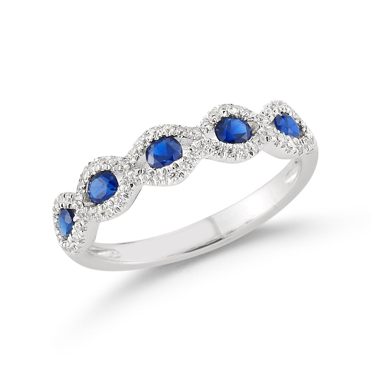 Classic ring in 14kw set with 5 Blue Sapphires T.W 0.65ct & 62 diamonds T.W 0.21ct
